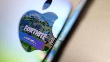 Fortnite's return to iPhones in the EU signifies a new era of app store competition. AFP