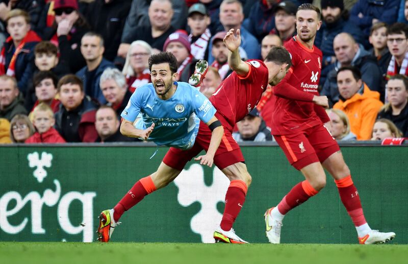Bernardo Silva - 7. A composed and dynamic performance for most of the game. He left the Liverpool midfield chasing shadows but got sat down by Salah before the Egyptian striker’s goal. AFP