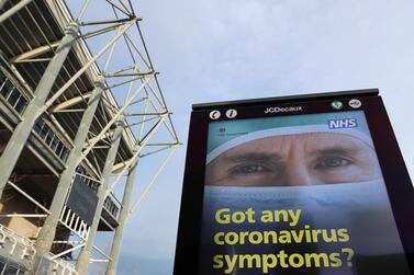 A National Health Service advertisement outside of Newcastle United's St James' Park stadium. Reports suggest that the Premier League club has been hit by a major Covid-19 outbreak. Reuters