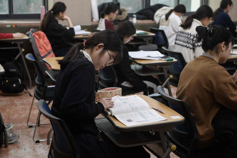 Students prepare to sit the exam at the Ehwa Girls Foreign Language High School in Seoul. AFP