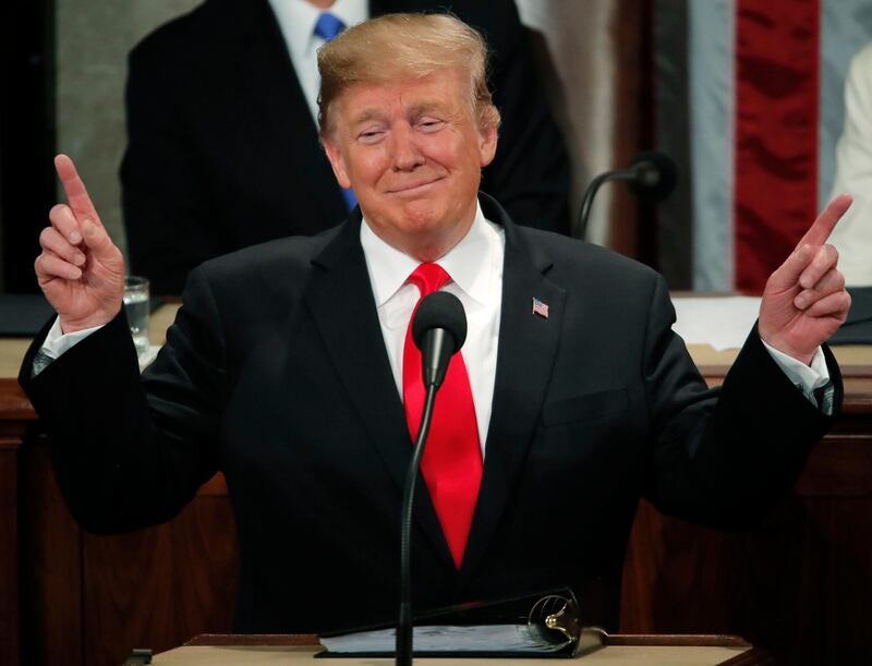 Donald Trump gestures during his State of the Union address. Reuters