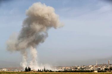 Smoke plumes billow following reported Syrian government forces’ bombardment in the southern countryside of Idlib AFP