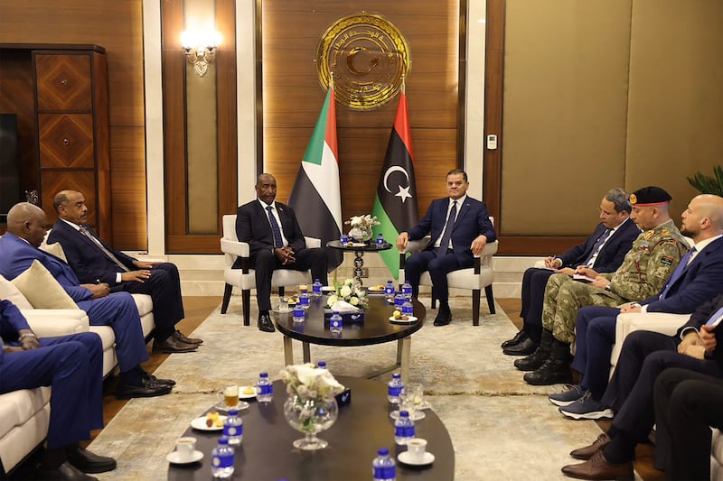 Abdul Hamid Dbeibah holds a meeting with Sudan's army chief Gen Abdel Fattah Al Burhan in Tripoli on Monday. Photo: Libyan Prime Minister’s Office  /  AFP