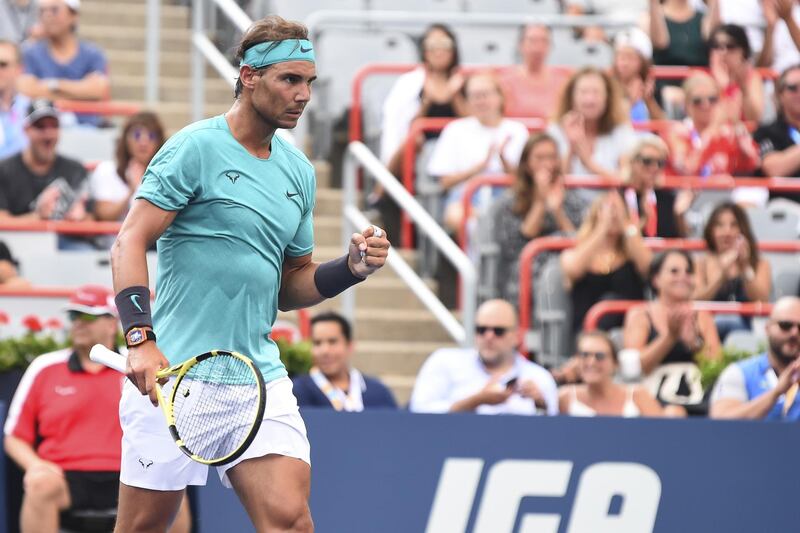 MONTREAL, QC - AUGUST 07: Rafael Nadal of Spain celebrates a point against Daniel Evans of Great Britain during day 6 of the Rogers Cup at IGA Stadium on August 7, 2019 in Montreal, Quebec, Canada.   Minas Panagiotakis/Getty Images/AFP
== FOR NEWSPAPERS, INTERNET, TELCOS & TELEVISION USE ONLY ==
