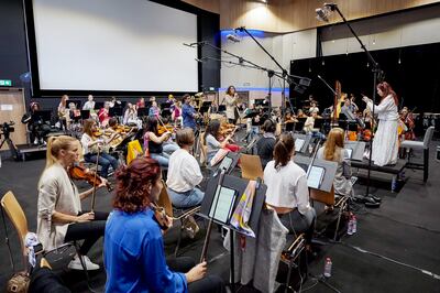 American-Argentinian opera singer Solange Meridian rehearses with the Firdaus Orchestra, conducted by Monica Woodman.