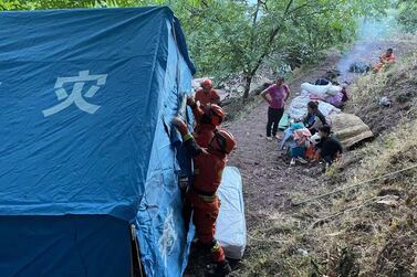 Emergency services set up tents for people displaced by an earthquake in Yangbi County, near the city of Dali, in China's south-west Yunnan province Three people were killed and 27 injured. AFP