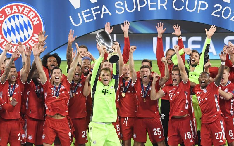 Goalkeeper and captain of Bayern Munich Manuel Neuer lifts the trophy after the team won the Uefa Super Cup final against Sevilla at the Puskas Arena in Budapest, Hungary. EPA