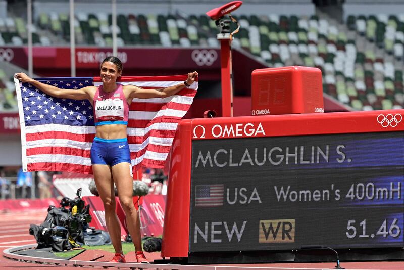 USA's Sydney Mclaughlin celebrates after winning the women's 400m hurdles final setting a new world record.
