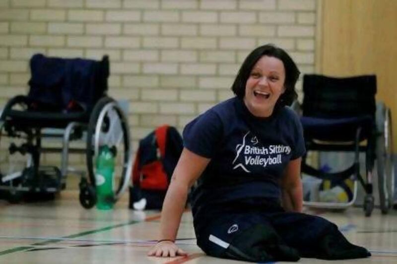 Martine Wright, a former marketing manager, who lost both legs in the July 7, 2005 London bombings works out in a gym with the Great Britain sitting volleyball team.