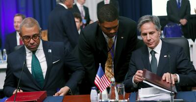 Britain's Foreign Secretary James Cleverly, left, and US Secretary of State Antony Blinken, right, attend the Nato foreign ministers' meeting at Parliament Palace in Bucharest, Romania. EPA