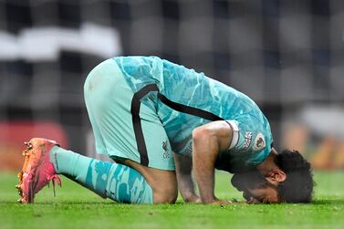 Liverpool's Mohamed Salah celebrates after scoring his side's fourth goal against Manchester United and Liverpool, one of his 22 in the Premier League this season. AP