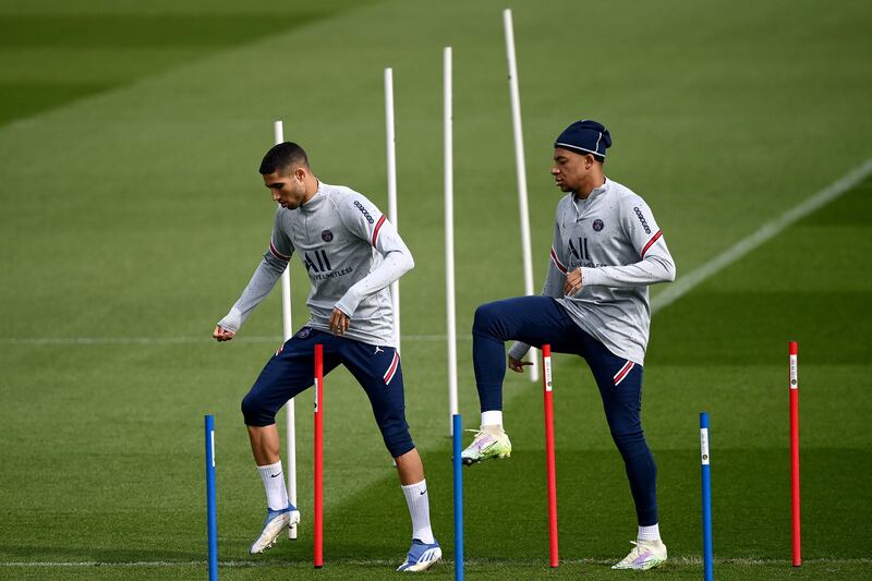 Achraf Hakimi and Kylian Mbappe during training. AFP