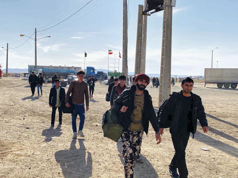 Afghan deportees arrive at Zero Point, an area between Iran and Afghanistan border where they are dropped off by Iranian authorities. Iran has forcefully deported over 250,000 Afghans back to a country where violence has been on a steady rise. Photo by Hikmat Noori