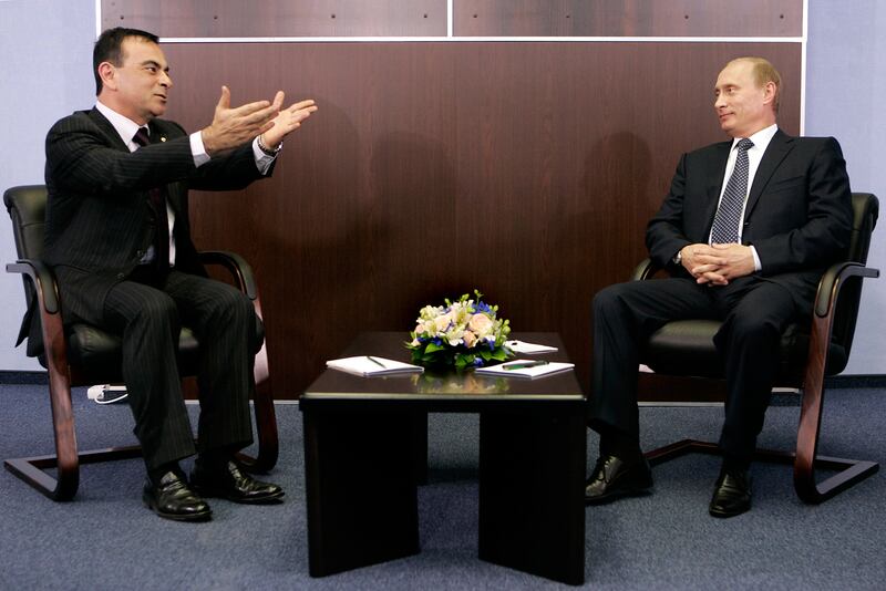 Mr Ghosn meets Russian President Vladimir Putin at St Petersburg International Economic Forum in 2006. Reuters