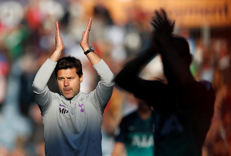 Soccer Football - Premier League - Huddersfield Town v Tottenham Hotspur - John Smith's Stadium, Huddersfield, Britain - September 29, 2018  Tottenham manager Mauricio Pochettino celebrates after the match  Action Images via Reuters/Andrew Boyers  EDITORIAL USE ONLY. No use with unauthorized audio, video, data, fixture lists, club/league logos or "live" services. Online in-match use limited to 75 images, no video emulation. No use in betting, games or single club/league/player publications.  Please contact your account representative for further details.