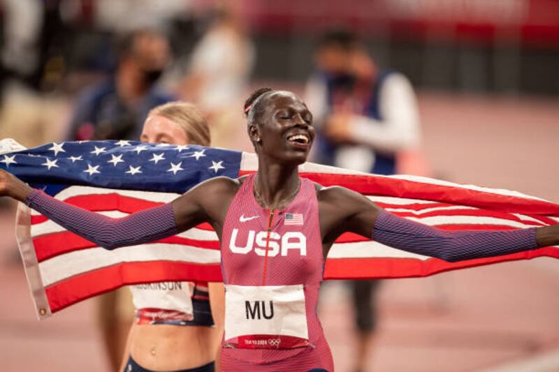 Athing Mu of the United States celebrates after winning the gold medal in the 800m.