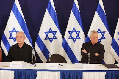 Yesterday, Israeli Prime Minister Benjamin Netanyahu, left, disbanded the country’s war cabinet following the resignation of political opponent Benny Gantz, right, over the latter’s claim that Mr Netanyahu has no post-war plan for Gaza. AP