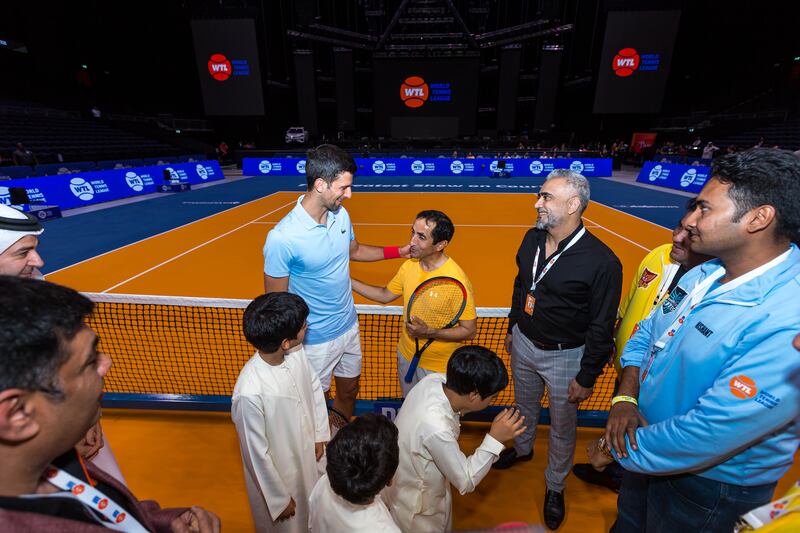 Sheikh Saeed bin Maktoum Al Maktoum and Novak Djokovic at the World Tennis League in Dubai. Photo: World Tennis League in Dubai