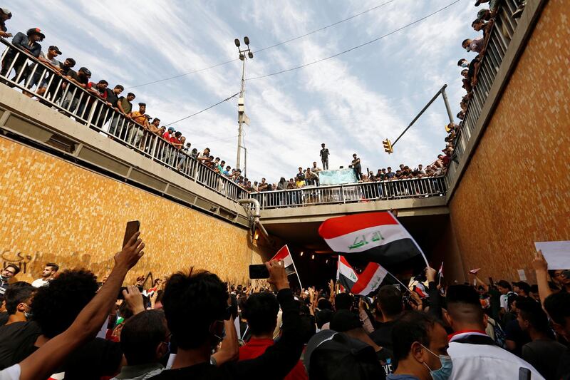 Iraqi demonstrators gather to mark the first anniversary of the anti-government protests in Baghdad. Reuters