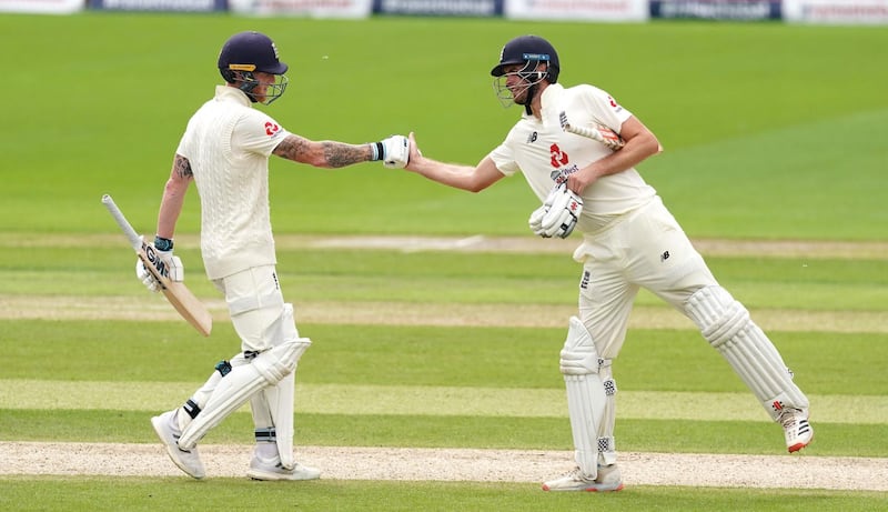 File photo dated 17-07-2020 of England's Ben Stokes (left) fist bumps Dom Sibley PA Photo. Issue date: Tuesday August 11, 2020. England opener Dom Sibley has called on his fellow batsmen to step up in the absence of Ben Stokes. See PA story CRICKET England. Photo credit should read Jon Super/NMC Pool/PA Wire.