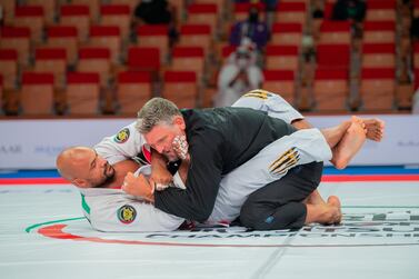 Brazilian Igor Silva (in white) won the Abu Dhabi World Masters-1 black belt 120kg heavyweight final from Canadian Bruno Munduruca at the Jiu-Jitsu Arena at the 12th staging of the World Pro on April 7, 2021. Courtesy UAEJJF