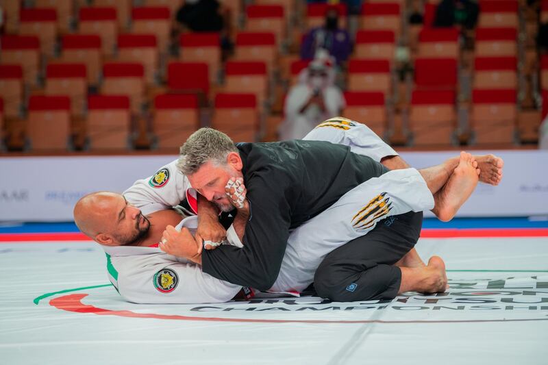 Brazilian Igor Silva (in white) won the Abu Dhabi World Masters-1 black belt 120kg heavyweight final from Canadian Bruno Munduruca at the Jiu-Jitsu Arena at the 12th staging of the World Pro on April 7, 2021. Courtesy UAEJJF