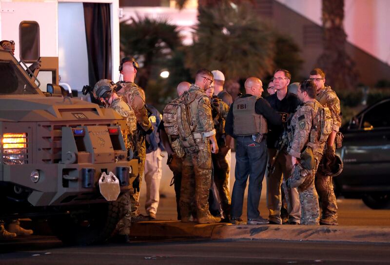 FBI agents confer in front of the Tropicana hotel-casino on October 2, 2017, after a mass shooting during a music festival on the Las Vegas Strip in Las Vegas, Nevada, U.S. REUTERS/Las Vegas Sun/Steve Marcus