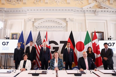 Britain's International Trade Secretary Anne-Marie Trevelyan (C) with her counterparts at a G7 trade summit at Mansion House, London. AFP