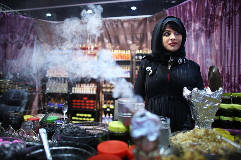 ABU DHABI, UNITED ARAB EMIRATES - - -  July 21, 2013 ---  The first day of the Ramadan & Eid Festival kicked off at ADNEC in Abu Dhabi on Sunday, July 21, 2013. The exhibition offers a variety of jewelry, clothes, traditional goods, unique gifts and more. Miriam Amzaeed has a booth with homemade perfume and bakoor that her mother makes in their home.   ( DELORES JOHNSON / The National ) ***** There is no reporter for this ****** *** Local Caption ***  DJ-2107-Ramadan Festival-003.jpg