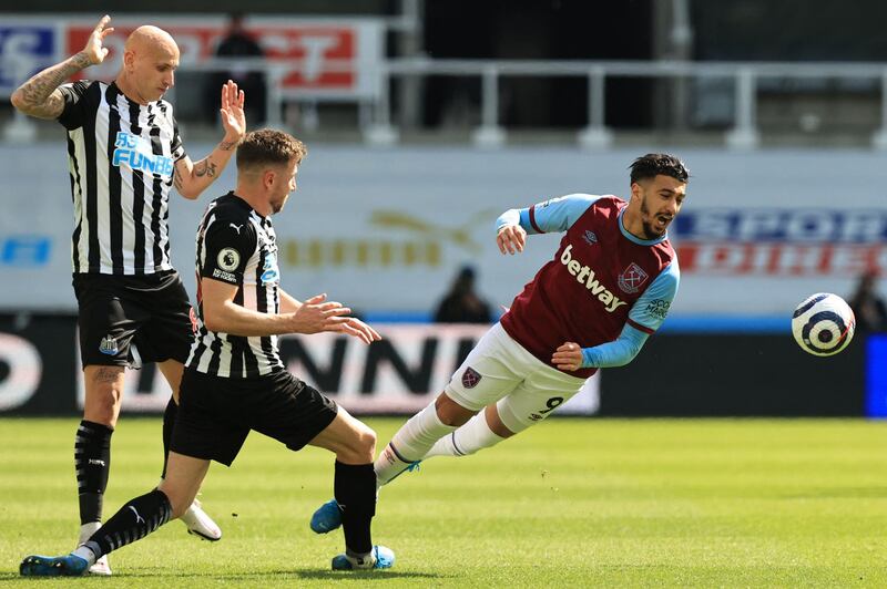 Paul Dummett - 6: Solid game from the Geordie defender although guilty of stupid foul on Coufal after an hour that handed West Ham free-kick in dangerous position. AFP