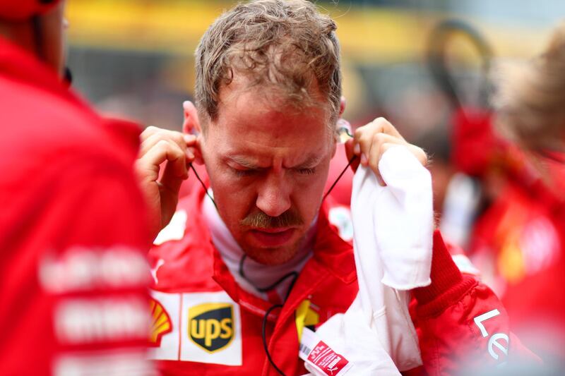 SHANGHAI, CHINA - APRIL 14: Sebastian Vettel of Germany and Ferrari prepares to drive on the grid before  the F1 Grand Prix of China at Shanghai International Circuit on April 14, 2019 in Shanghai, China. (Photo by Dan Istitene/Getty Images)