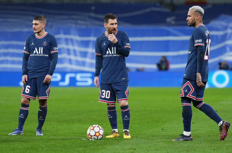 Marco Verratti, Lionel Messi and Neymar of Paris Saint-Germain look dejected as they exit the Champions League. Getty