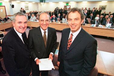 Former British prime minister Tony Blair, former US senator George Mitchell and former Irish prime minister Bertie Ahern after signing the Good Friday Agreement in 1998. Blair has since called for a truth commission to address grievances in Northern Ireland. AP Photo