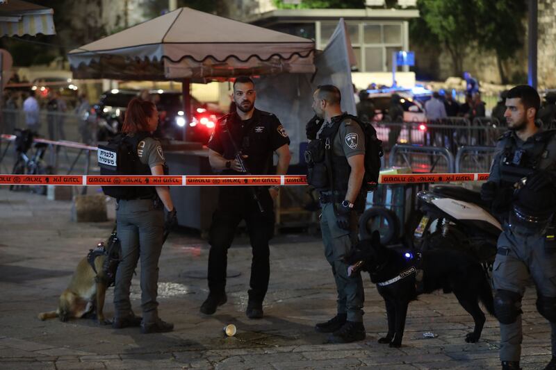 Israeli police stand guard at the Damascus Gate in the old city of Jerusalem where a Palestinian man was shot after allegedly stabbing an officer. EPA