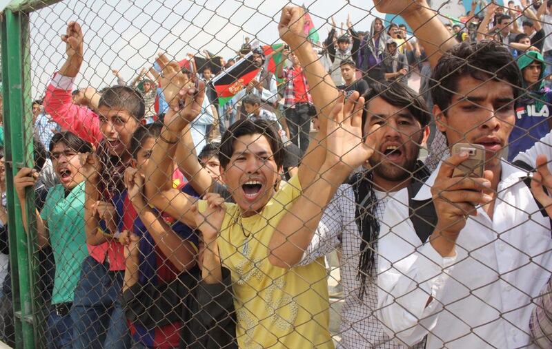 Afghans gather to greet the country's returning heroes. S Sabawoon / EPA