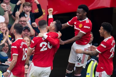 Manchester United's Cristiano Ronaldo (C) celebrates scoring his hat-trick goal and the fifth goal making the score 3-2 during the English Premier League soccer match between Manchester United vs Norwich at Old Trafford, Manchester, Britain, 16 April 2022.   EPA/PETER POWELL EDITORIAL USE ONLY.  No use with unauthorized audio, video, data, fixture lists, club/league logos or 'live' services.  Online in-match use limited to 120 images, no video emulation.  No use in betting, games or single club / league / player publications