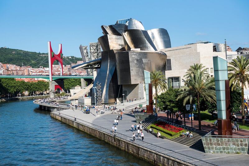 Frank Gehry's Guggenheim Museum has become the iconic symbol of Bilbao, an exuberant design of a ship that complements the port city and its shipping industry.