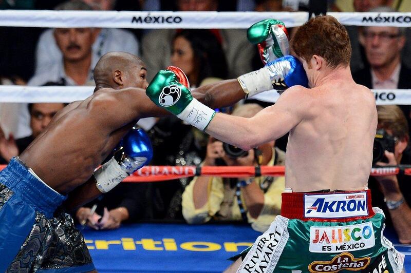 Mayweather, however, is too fast for the 23 year old and gives no room for him to stride forward. Ethan Miller / Getty Images / AFP
