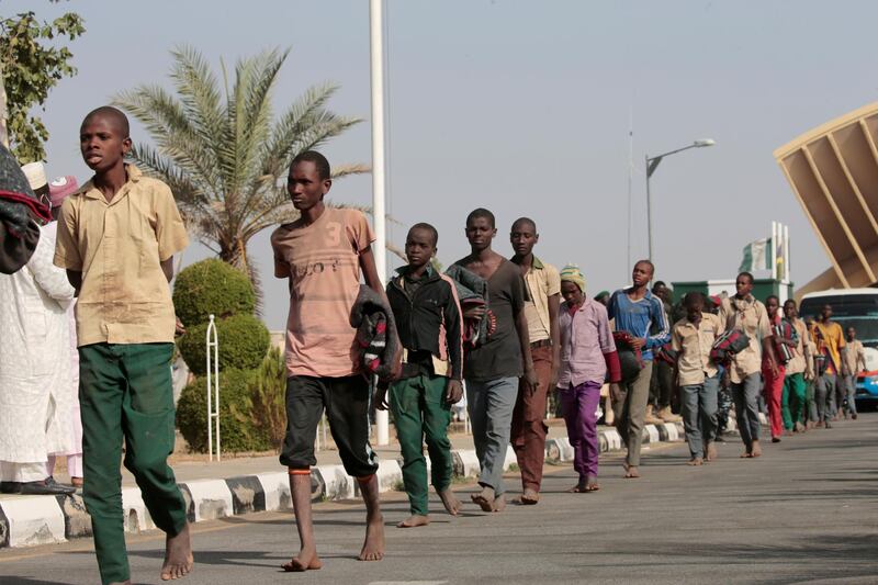 Freed Nigerian schoolboys walk after they were rescued by security forces in Katsina, Nigeria. REUTERS