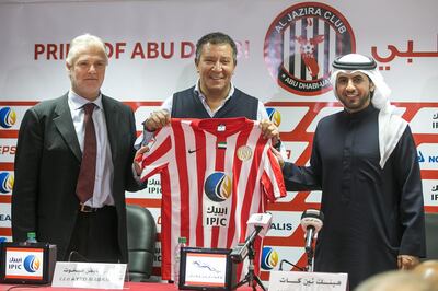 Abu Dhabi, United Arab Emirates. December 29, 2015///

From left to right: Gianluca Nani, Sporting Director, Henk Ten Cate, Al Jazira’s new Head Coach, and Ayed Mabkhout, CEO of Al Jazira Club, pose with TenCate's new jersey. AbuDhabi, United Arab Emirates. Mona Al Marzooqi/ The National 

ID: 66231
Reporter: John McAuley 
Section: Sport  *** Local Caption ***  151229-MM-SP-JaziranewCoach-009.JPG