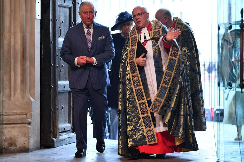 Britain's Prince Charles, Prince of Wales (L) and The Very Reverend Dr David Hoyle, Dean of Westminster. AFP