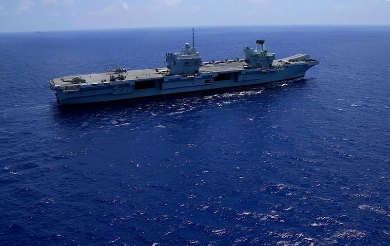 HMS Defender had been part of the carrier strike group led by aircraft carrier HMS Queen Elizabeth, pictured above. AP Photo