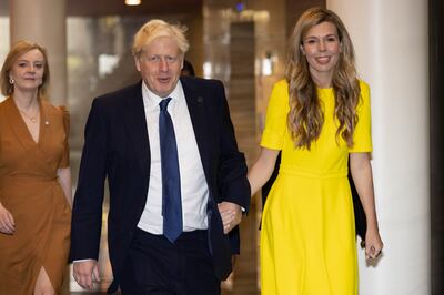 British Prime Minister Boris Johnson and his wife Carrie Johnson arrive for the opening ceremony of the Commonwealth Heads of Government Meeting at Kigali Convention Centre in Rwanda. Getty Images