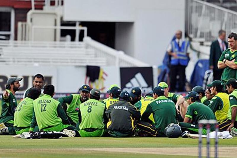 Shahid Afridi, left, the Pakistan captain, talks with his teammates at Lord’s, England, in September. The team will look to get back to their winning ways as the world watches.