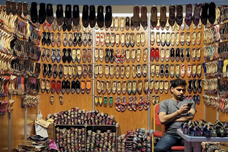  ABU DHABI , UNITED ARAB EMIRATES – July 2 , 2016 : One of the shoe shop at the Ramadan night market held at ADNEC in Abu Dhabi.  ( Pawan Singh / The National ) For Focal Point
 *** Local Caption ***  PS0207- FOCAL POINT01.jpgPS0207- FOCAL POINT01.jpg