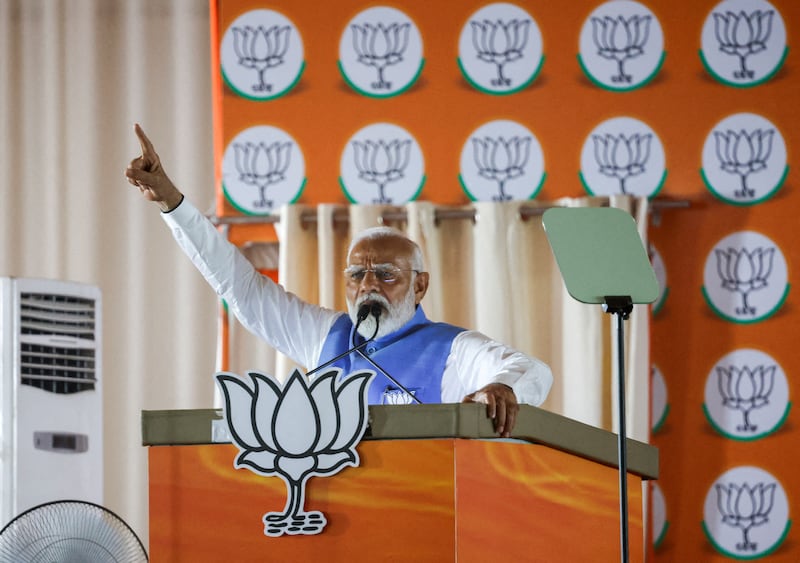 Indian Prime Minister Narendra Modi gestures as he addresses supporters during an election campaign rally in New Delhi. Reuters