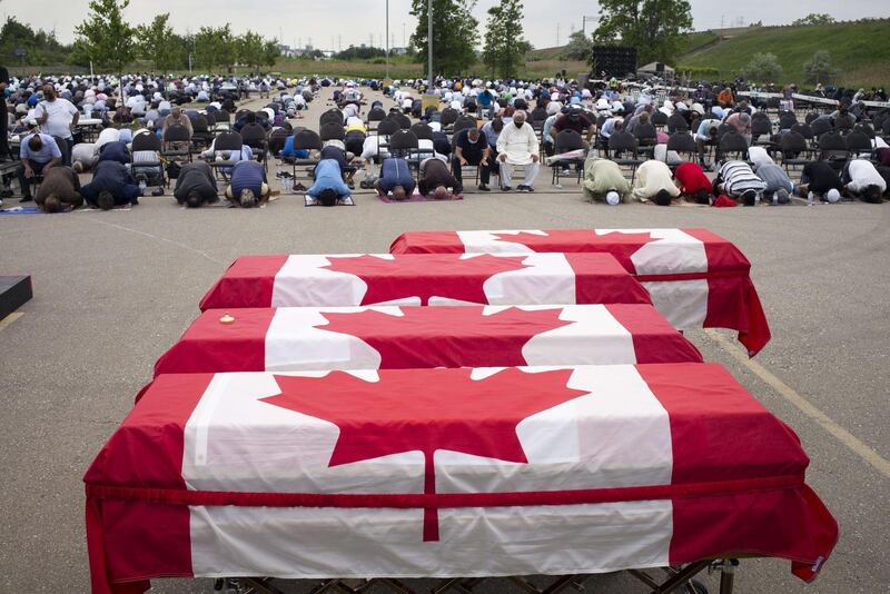 LONDON, CANADA - JUNE 12: Mourners and supporters gather for a public funeral for members of the Afzaal family at the Islamic Centre of Southwest Ontario on June 12, 2021 in London, Canada. The Muslim family was run over by a truck in a racially-motivated terror attack on Sunday, leaving the community shattered by grief.   Ian Willms/Getty Images/AFP
== FOR NEWSPAPERS, INTERNET, TELCOS & TELEVISION USE ONLY ==
