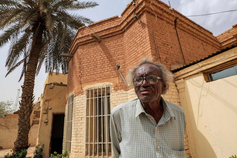 Dr Mansour Israil, the grandson of an Iraqi Jew who settled in Sudan and whose family later converted to Islam, outside his home in the neighbourhood once known as "the Jewish quarter" in Omdurman, the Sudanese capital's twin city across the Nile river. AFP