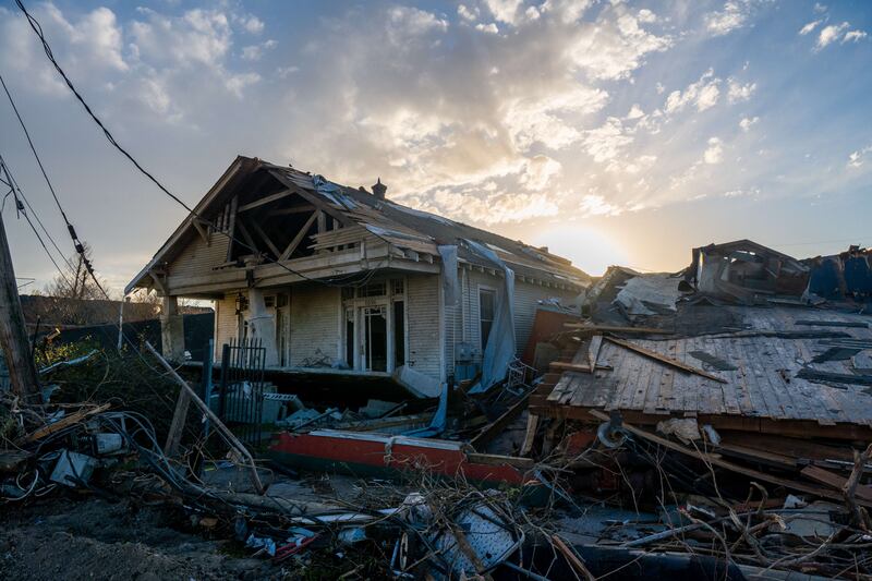 A tornado-damaged home is seen among the wreckage in the Arabi neighbourhood in New Orleans, Louisiana. Getty Images / AFP