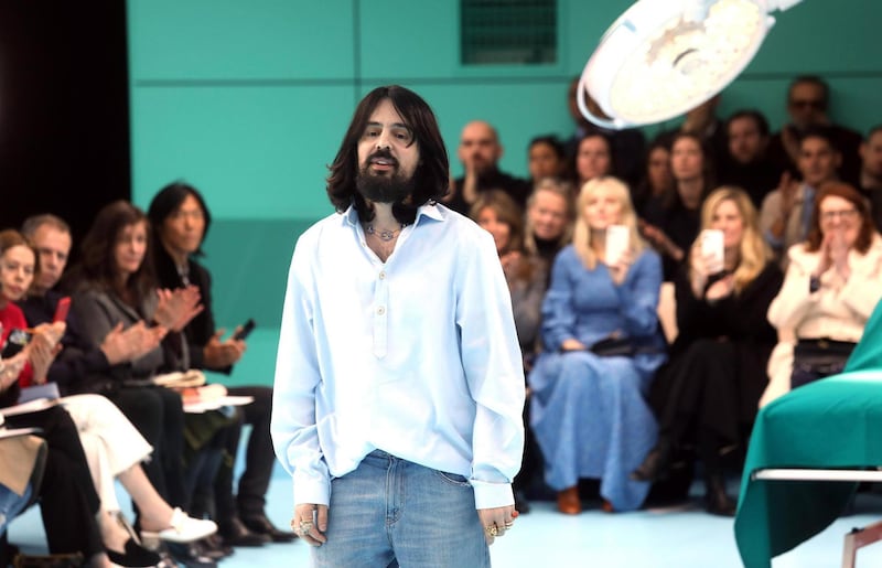 epa06550546 Italian designer Alessandro Michele appears on the catwalk after his show for Italian label Gucci during the Milan Fashion Week, in Milan, Italy, 21 February 2018. The Fall-Winter 2018/2019 Women's collections are presented at the Milano Moda Donna from 20 to 26 February.  EPA/MATTEO BAZZI